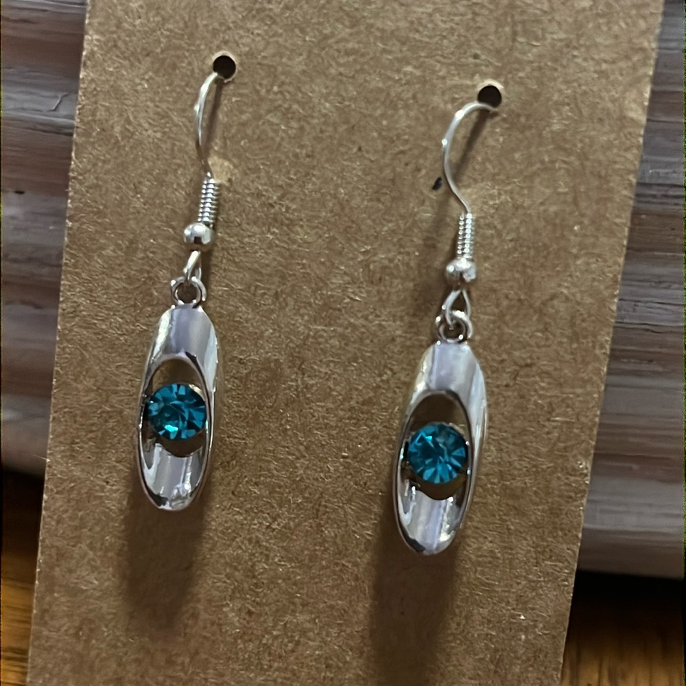 Silver tone and faux blue topaz earrings-NWT